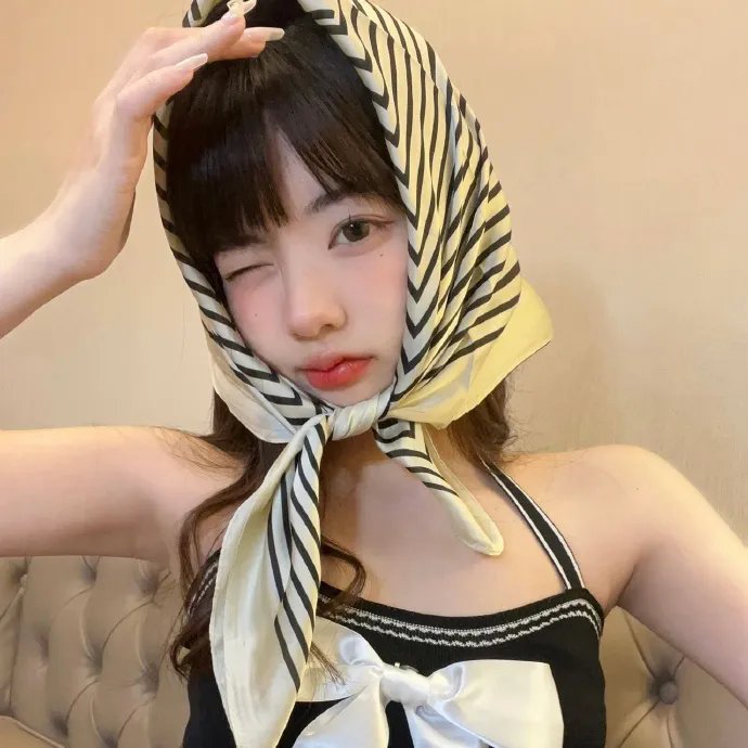 桃花含露又春风
